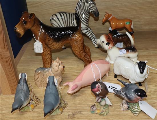 A collection of twelve mixed Beswick animals and birds